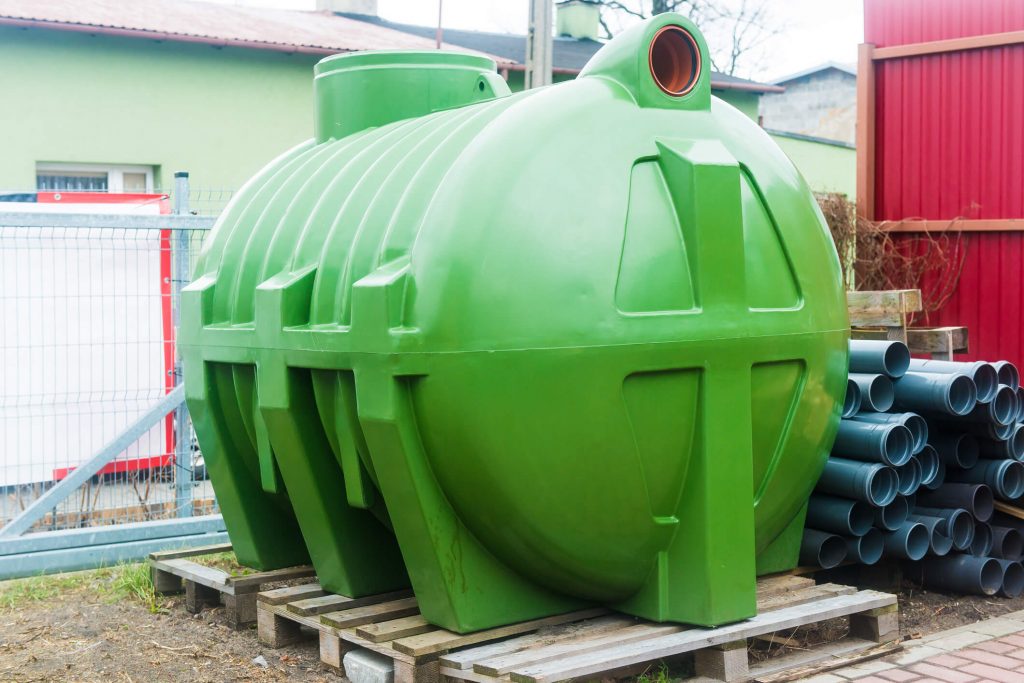 Large green septic tank